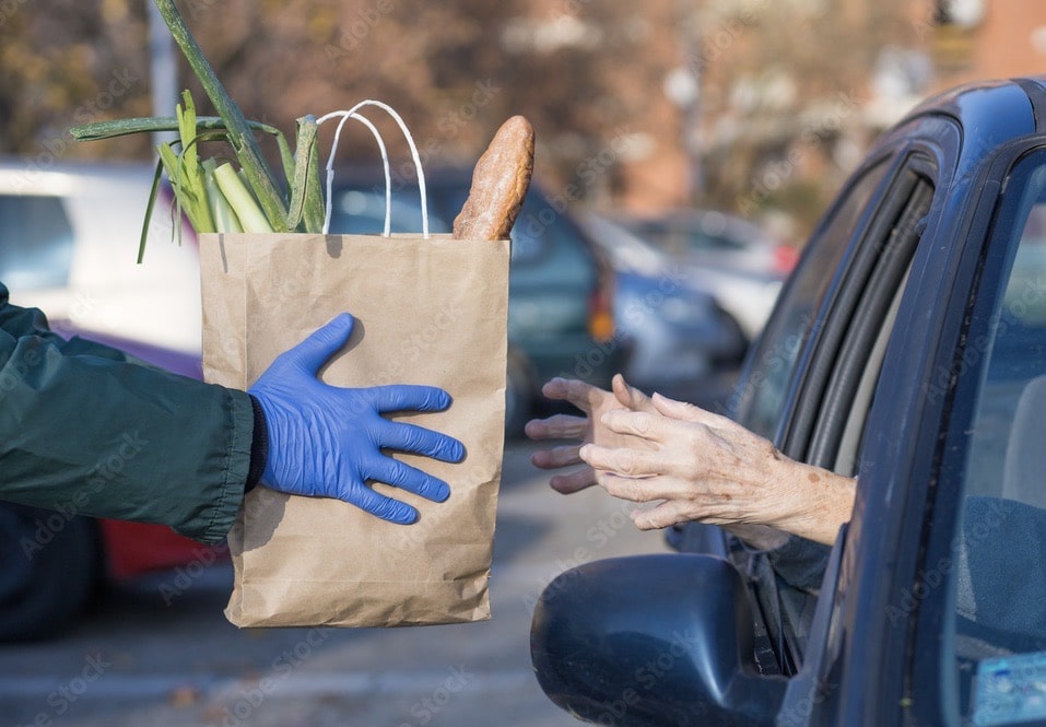 Recipient receives food from a Food Bank