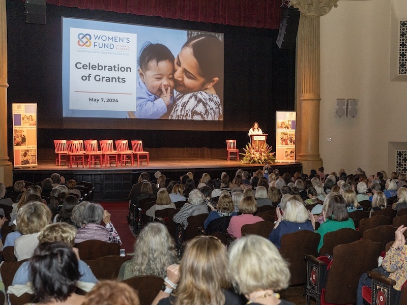 Chair Jamie Dufek speaks at the Celebration of Grants 