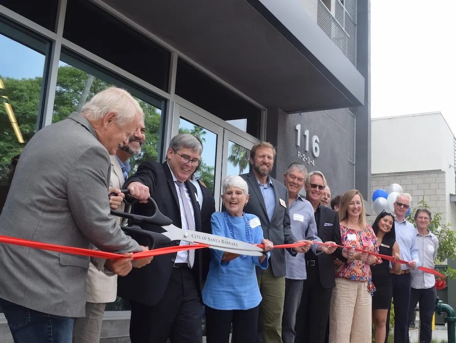 Mayor Randy Rowse, Housing Authority of the City of Santa Barbara Director Rob Fredericks and others cut the ribbon to the 28-unit Vera Cruz Village on Thursday, August 31, 2023. | Credit: Ryan P. Cruz