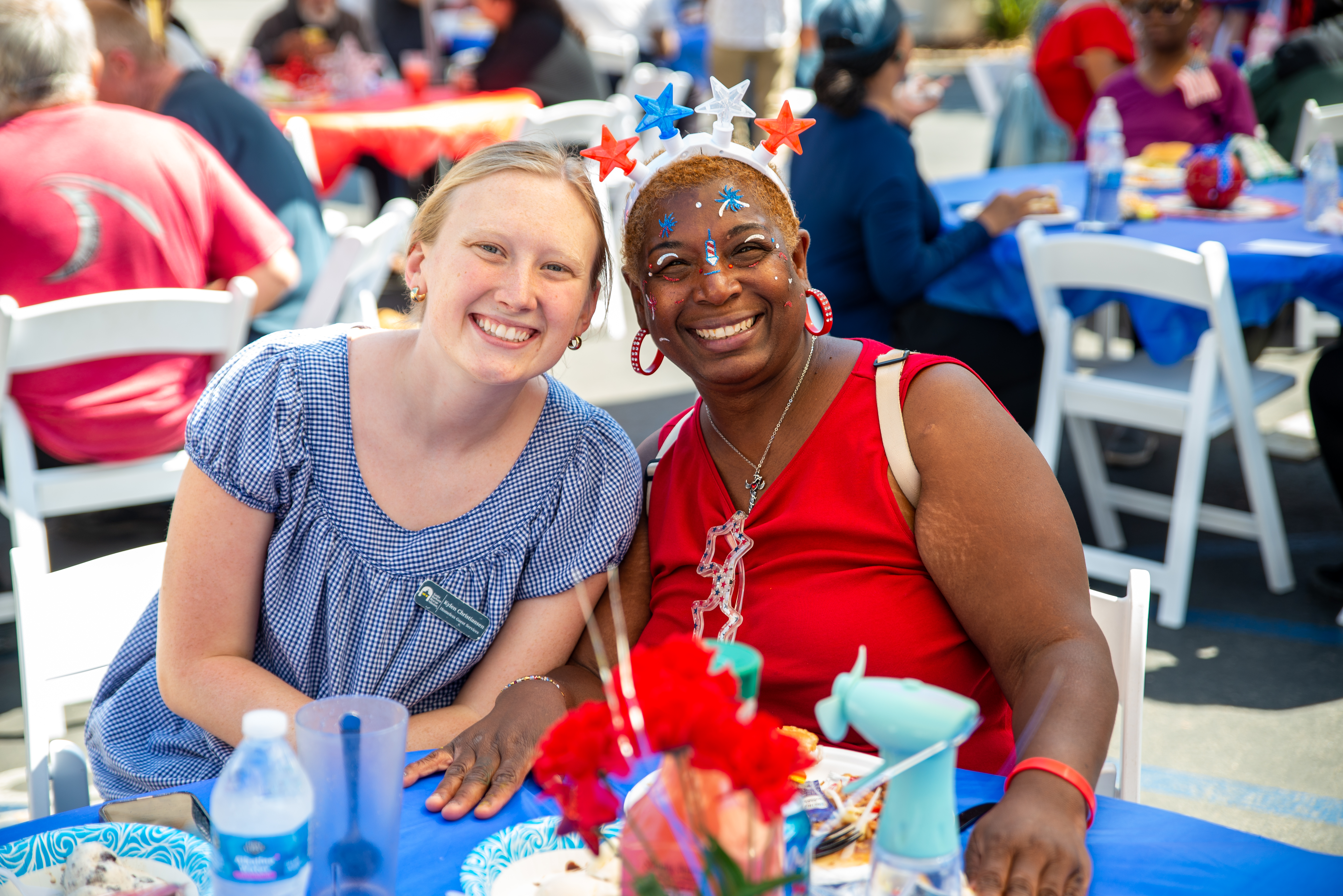 Women smiling at holiday gathering
