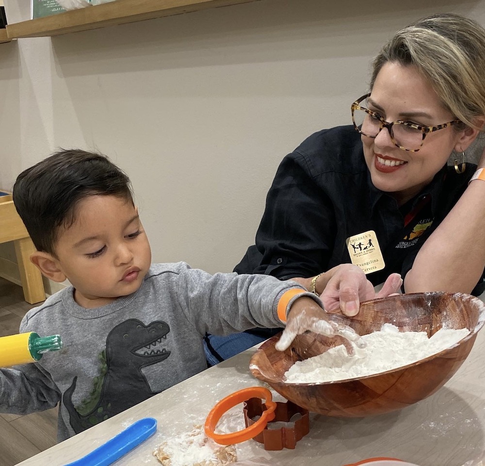 preschool boy with child care provider