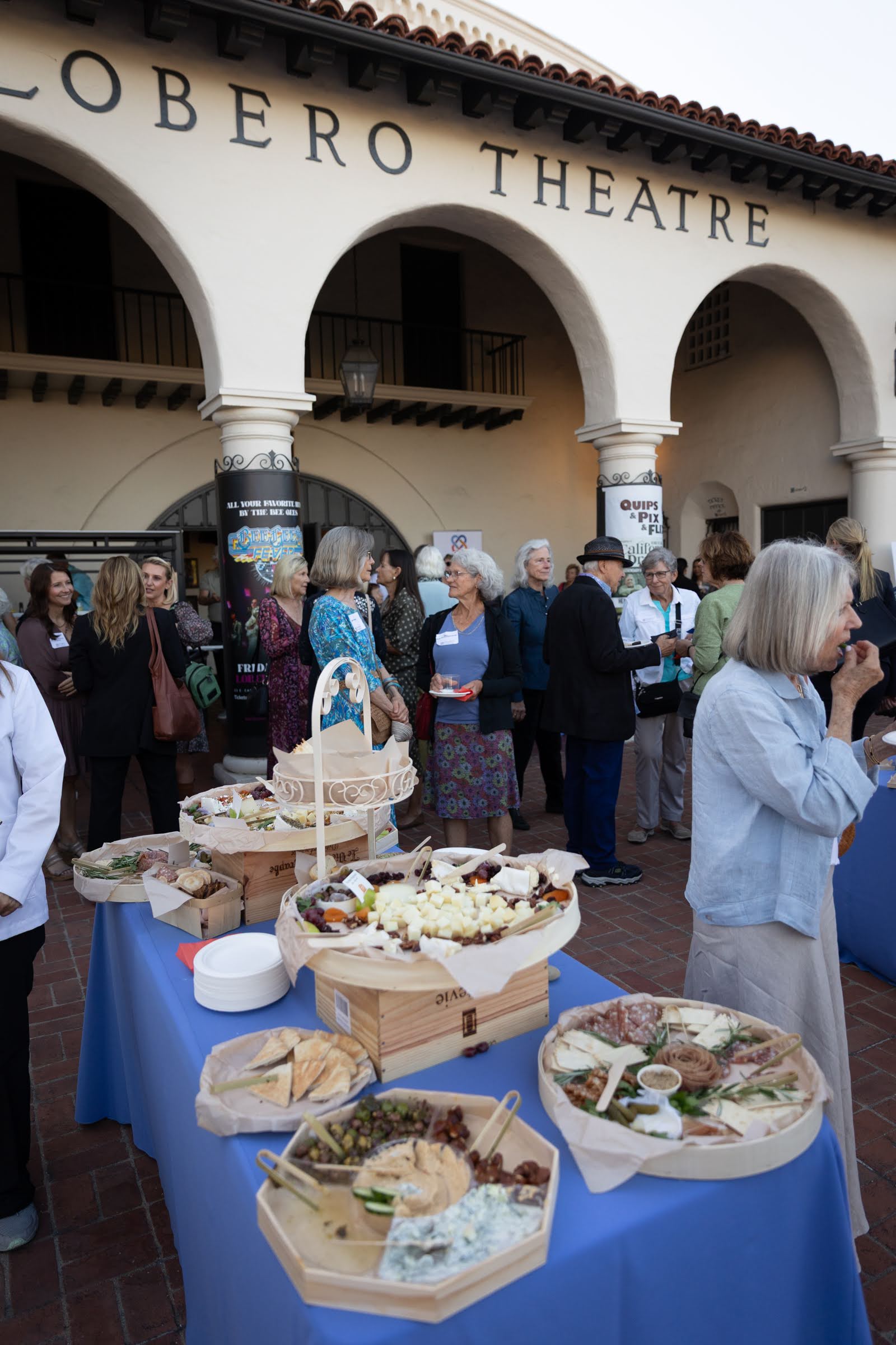 Women gathered outside the Lobero Theatre