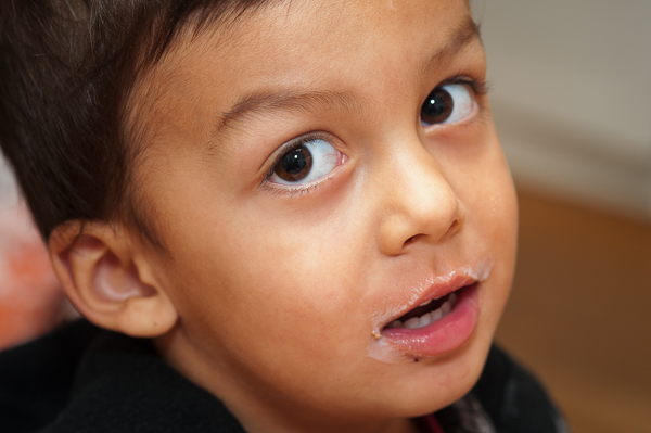 Storyteller Children's Center: little boy with milk "mustache"