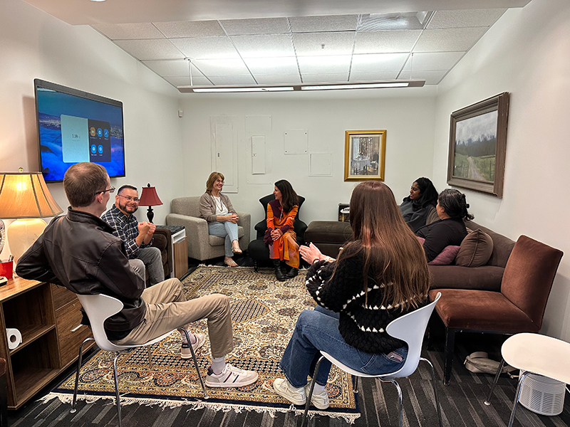 Group of adults sitting in a counseling room