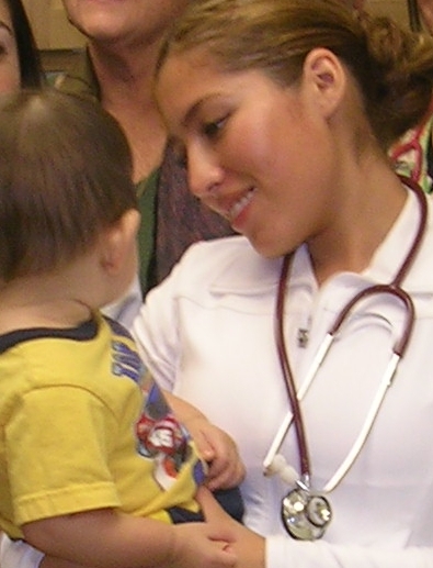 2008 SB Neighborhood Clinics nurse with a little patient 