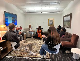 Group of adults sitting in a counseling room