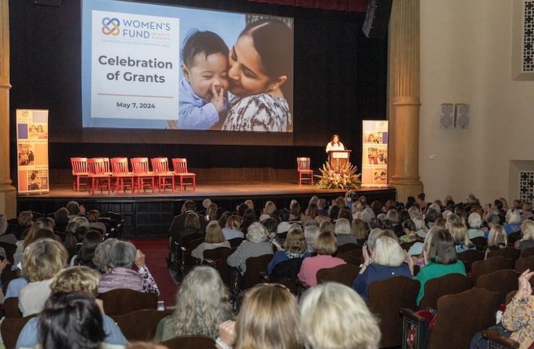 Chair Jamie Dufek speaks at the Celebration of Grants 