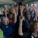 Women's Fund members and guests tour grantee sites on four SB Airbuses