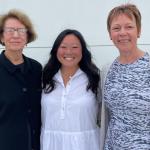 Research Committee Co-Chair Yonie Harris, Board Chair Jamie Dufek, and Research Committee Co-Chair Marita Hawryluk