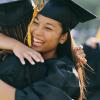 Childrens Academy graduates happily hugging