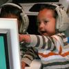 Mobile Waterford: Boy with headphones pointing at computer screen